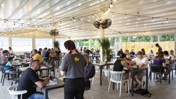 Breakfast and dinner served, pizza