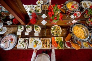 Daily buffet breakfast (EUR 60 per person)