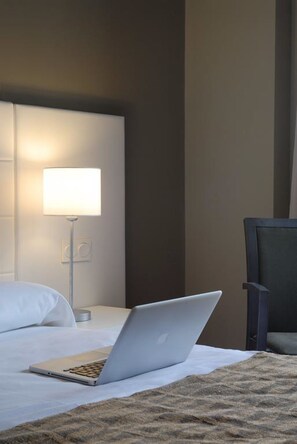 Double Room | Minibar, in-room safe, desk, blackout drapes
