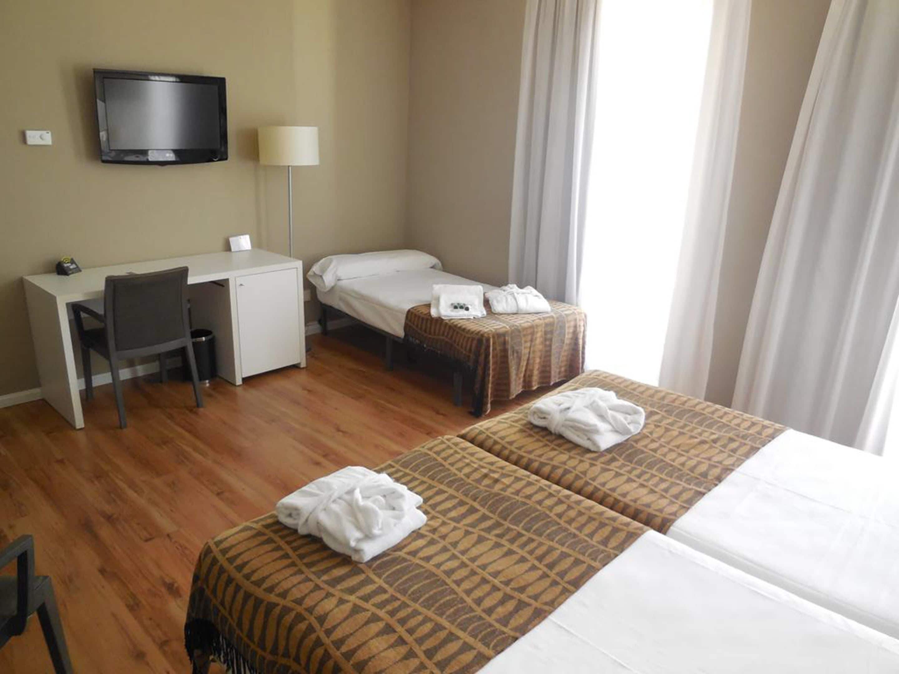 double room | minibar, in-room safe, desk, blackout curtains