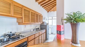 Apartment, Multiple Beds | Private kitchen | Fridge, microwave, oven, stovetop