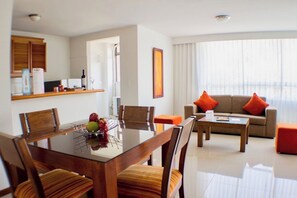 Standard Apartment | Living area | 32-inch LCD TV with satellite channels, TV