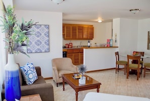 Appartement Deluxe, 1 grand lit et 1 canapé-lit, non-fumeur, cuisine | Coin séjour