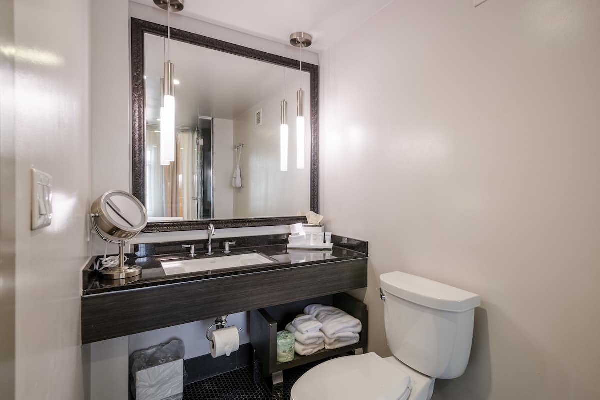 one king bed (forty winks room) | bathroom | designer toiletries, hair dryer, bathrobes, towels