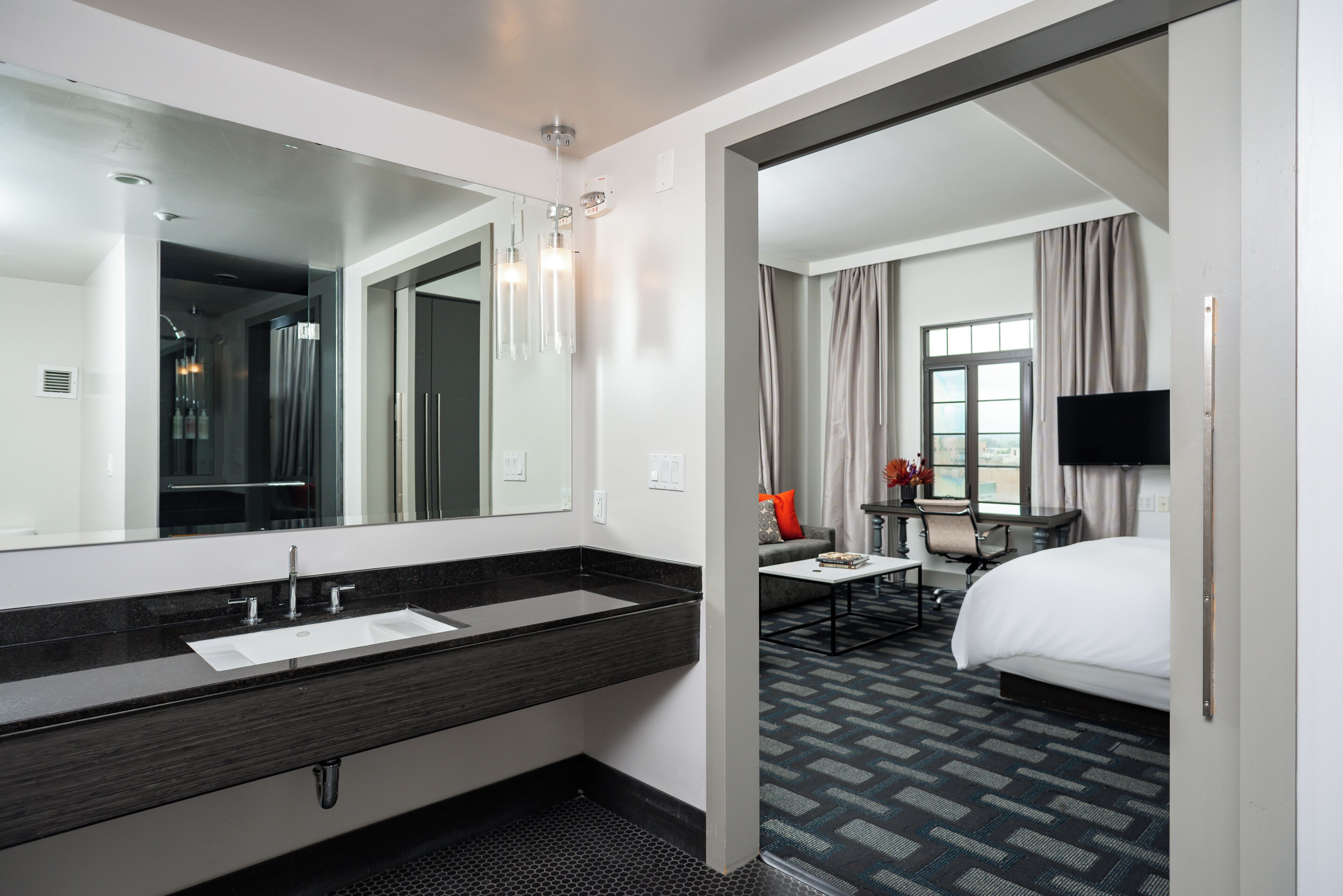 corner pocket | bathroom | designer toiletries, hair dryer, bathrobes, towels