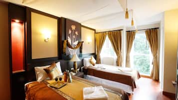 Deluxe Twin Room, 2 Single Beds | In-room safe, individually decorated, desk, free WiFi