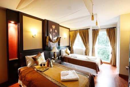 Deluxe Twin Room, 2 Twin Beds | In-room safe, individually decorated, desk, free WiFi