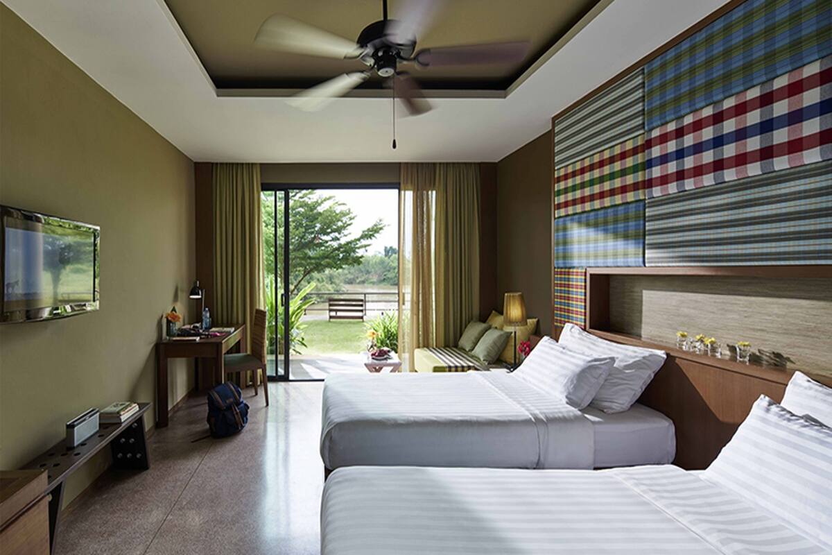 Deluxe Double or Twin Room | Minibar, in-room safe, desk, cribs (free)