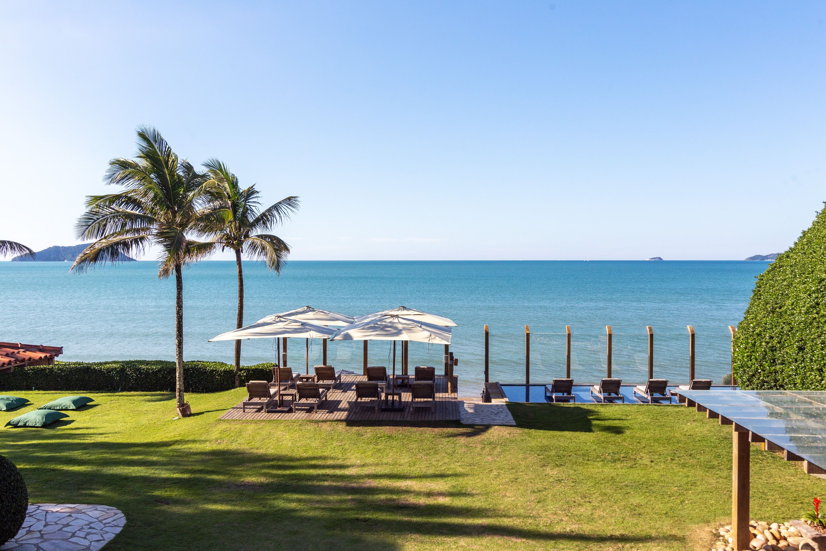 On the beach, white sand, free beach cabanas, sun loungers