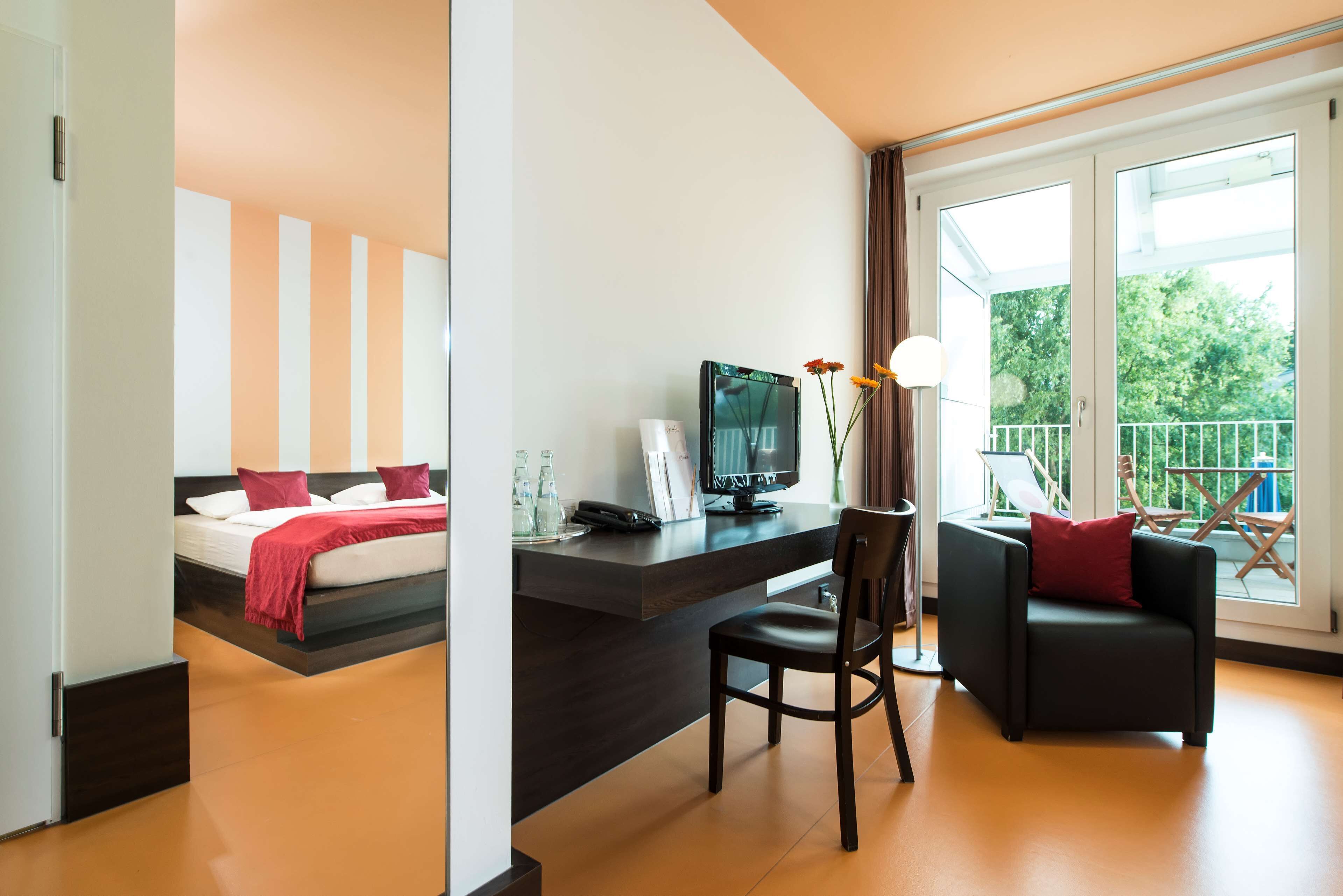room, balcony, garden view | 1 bedroom, premium bedding, in-room safe, desk