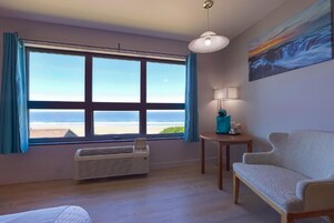 Room, 1 King Bed, Partial Ocean View | Desk, iron/ironing board, free WiFi, bed sheets