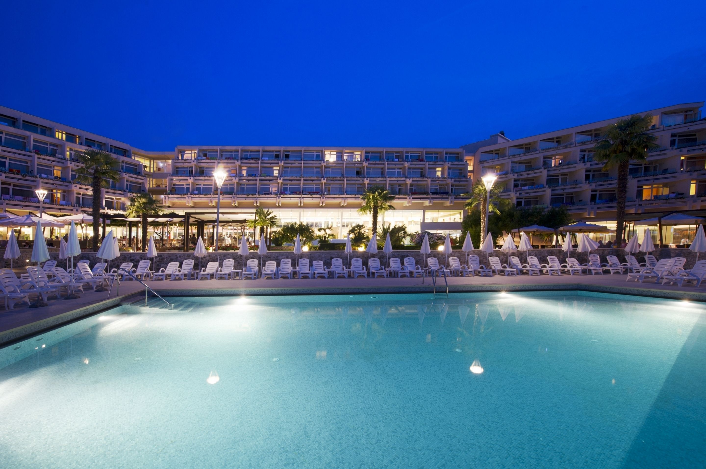 seasonal outdoor pool, pool umbrellas, pool loungers