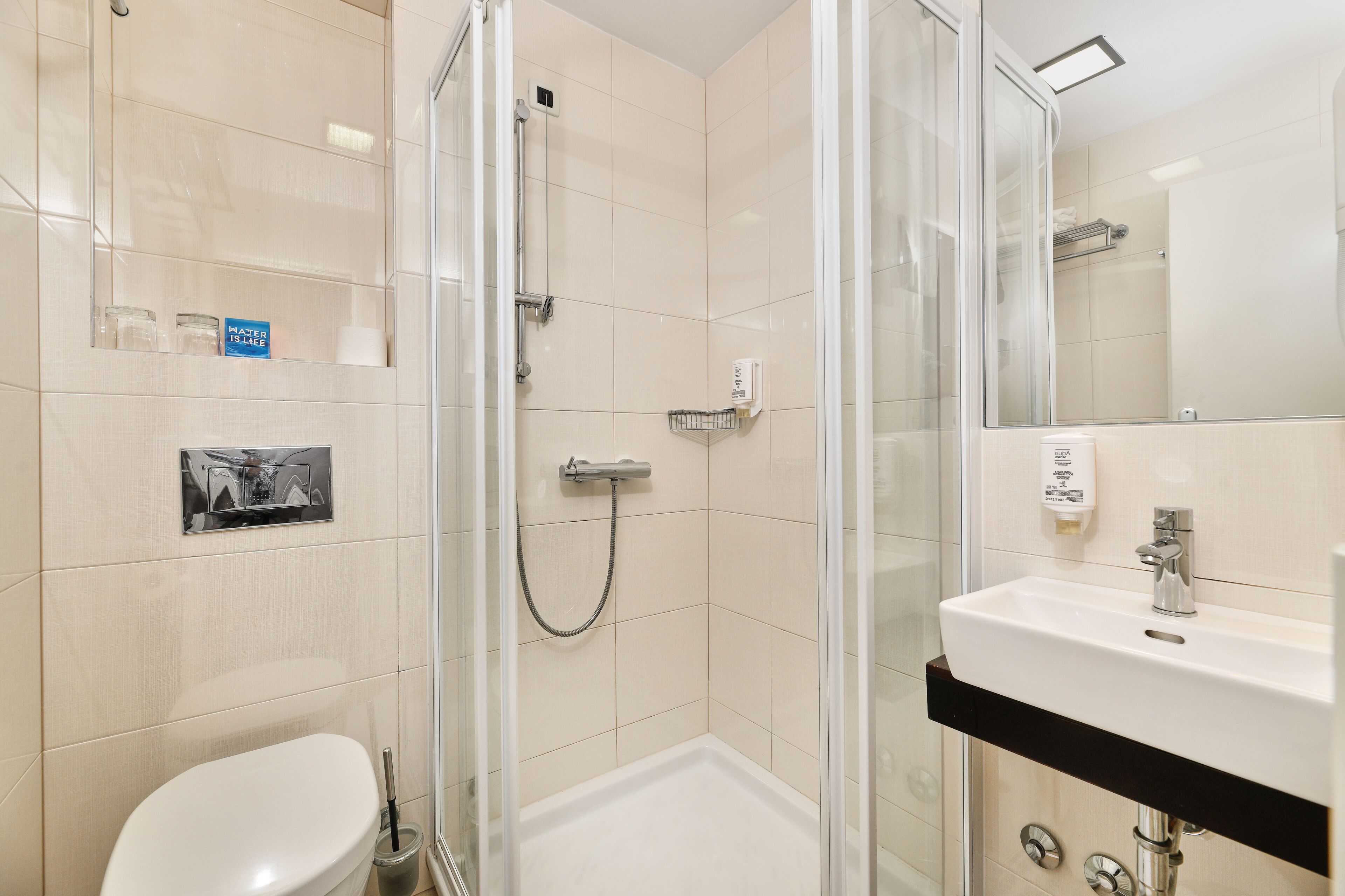 shower, free toiletries, hair dryer, towels