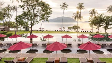 Outdoor pool, open 7:00 AM to 7:00 PM, pool umbrellas, pool loungers