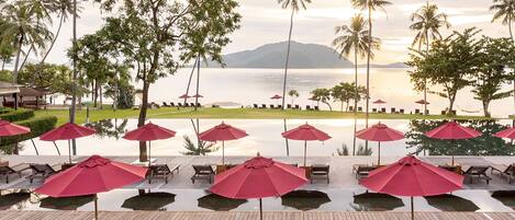Outdoor pool, open 7:00 AM to 7:00 PM, pool umbrellas, sun loungers