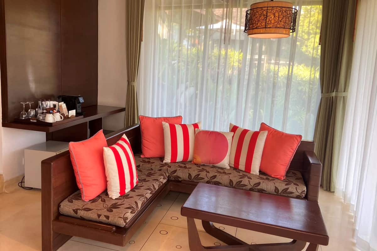 two bedroom pool villa | living room | 32-inch flat-screen tv with cable channels, tv