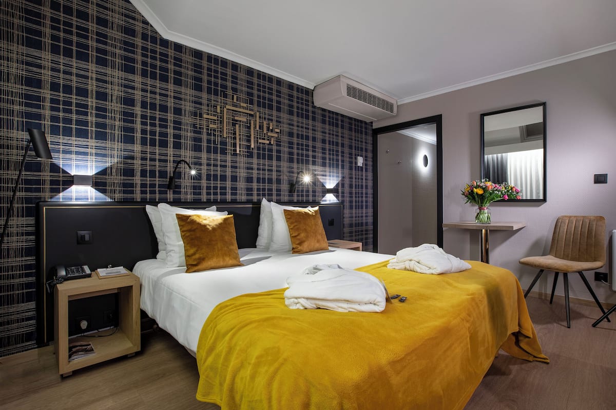 Ropa de cama de alta calidad y minibar