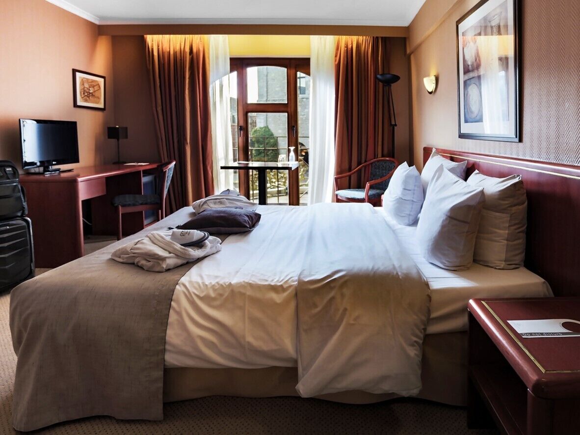 business room | 1 bedroom, premium bedding, minibar, in-room safe