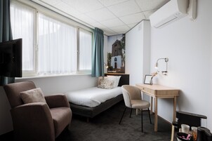 Standard Single Room | Blackout drapes, soundproofing, cribs (surcharge), WiFi (free)