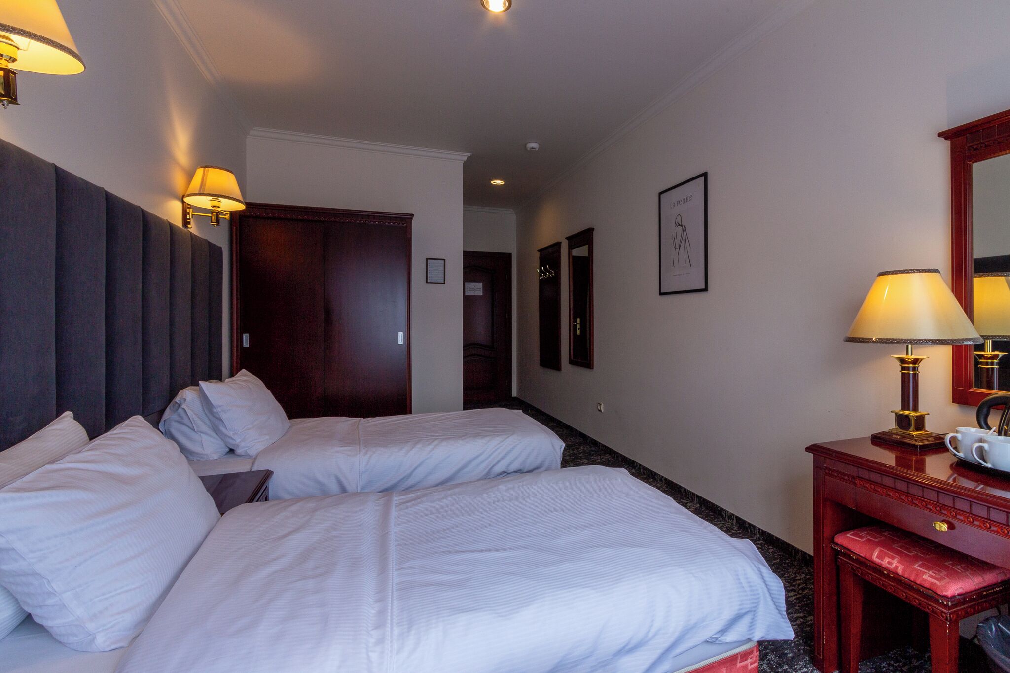 twin room | in-room safe, desk, laptop workspace, blackout curtains