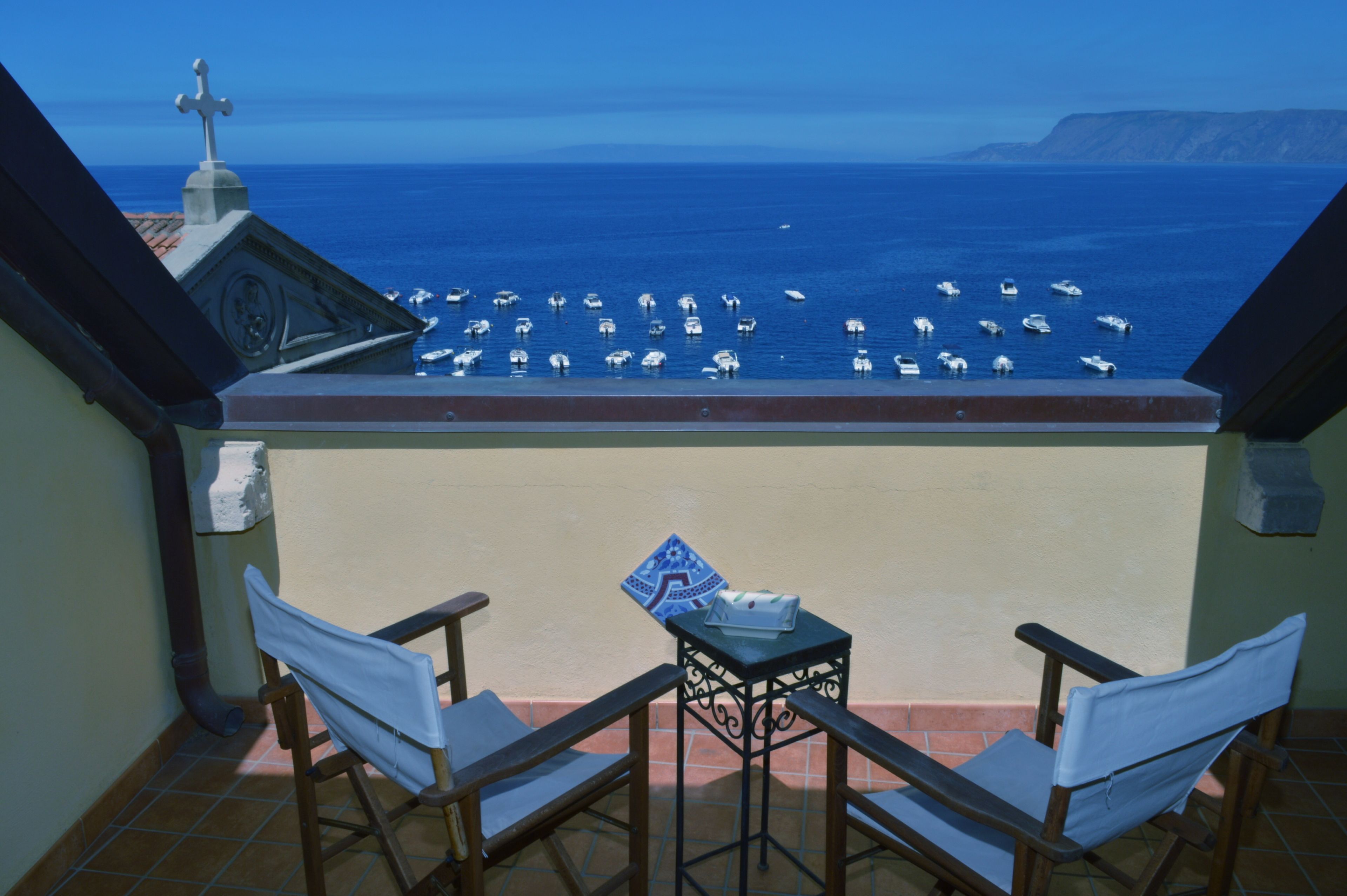 Habitación doble superior, vista al mar | Terraza o patio