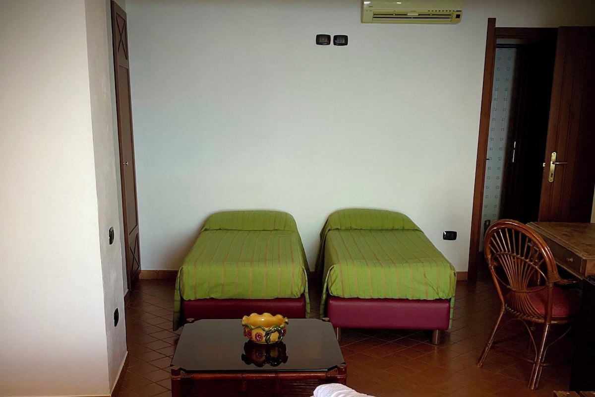 Standard Quadruple Room | Minibar, in-room safe, desk, cribs/infant beds