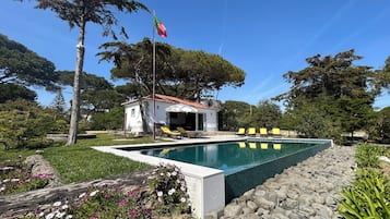 Outdoor pool, open 9:30 AM to 7:00 PM, pool umbrellas, sun loungers