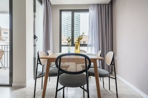 Two-Bedroom Apartment with Balcony | Living area | 50-inch Smart TV with cable channels, TV