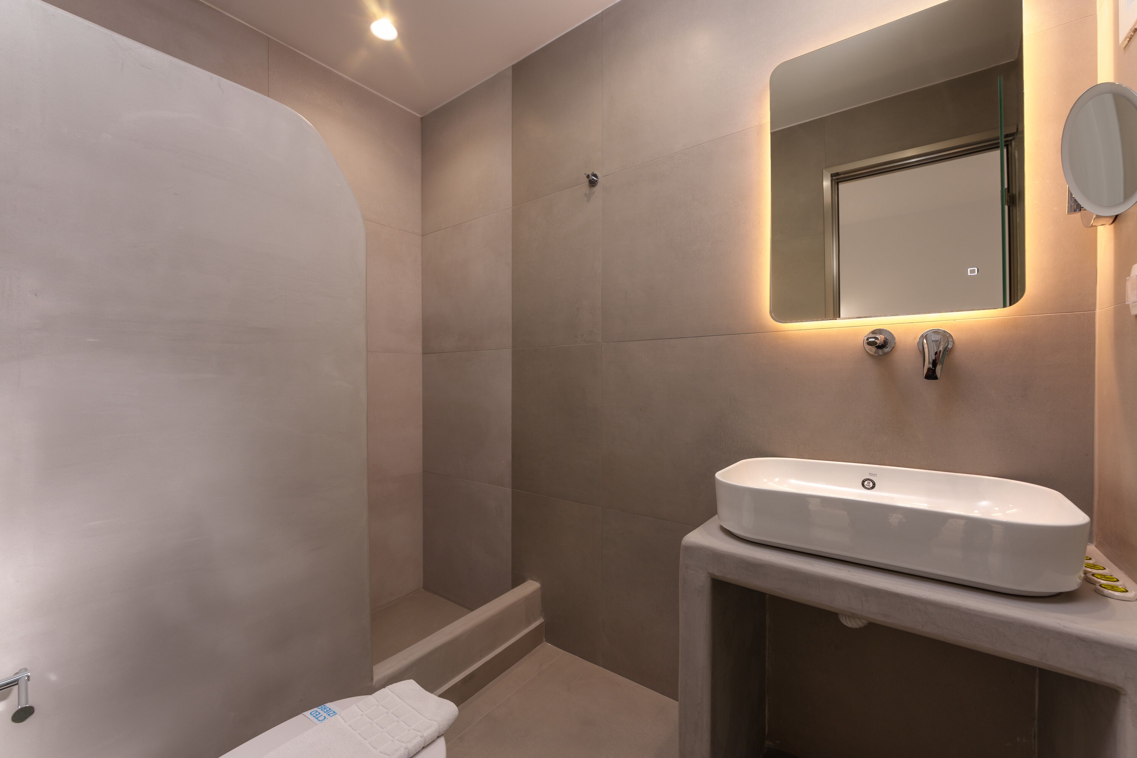 deluxe quadruple room | bathroom | shower, free toiletries, hair dryer, towels