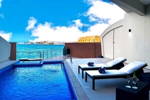 Villa, 4 Bedrooms (Private Pool) | Minibar, in-room safe, soundproofing, iron/ironing board