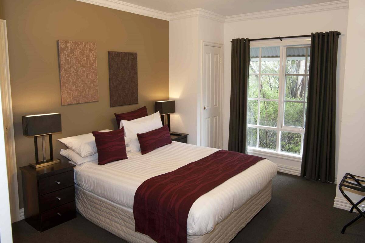 1 bedroom, blackout drapes, iron/ironing board, cribs (free)