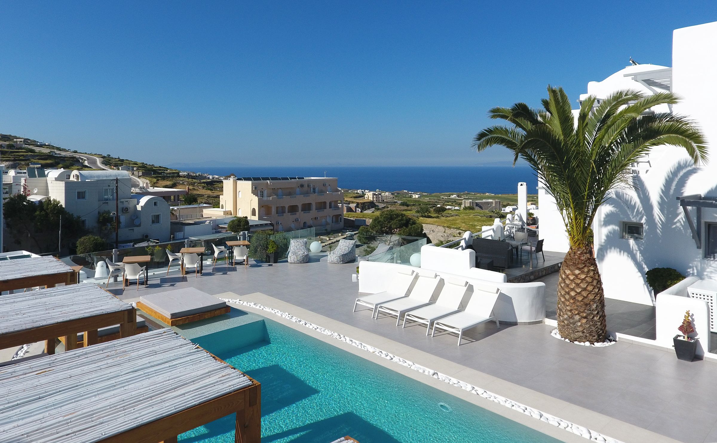 seasonal outdoor pool, pool umbrellas, pool loungers