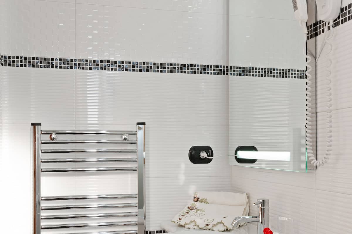 shower, hair dryer, bathrobes, slippers