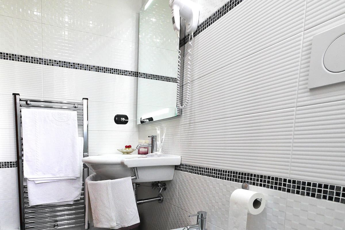 Bathroom | Shower, hair dryer, bathrobes, slippers