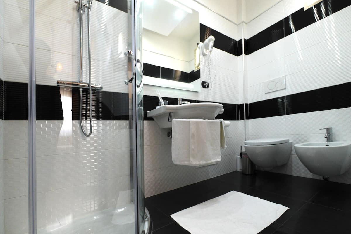 Bathroom | Shower, hair dryer, bathrobes, slippers