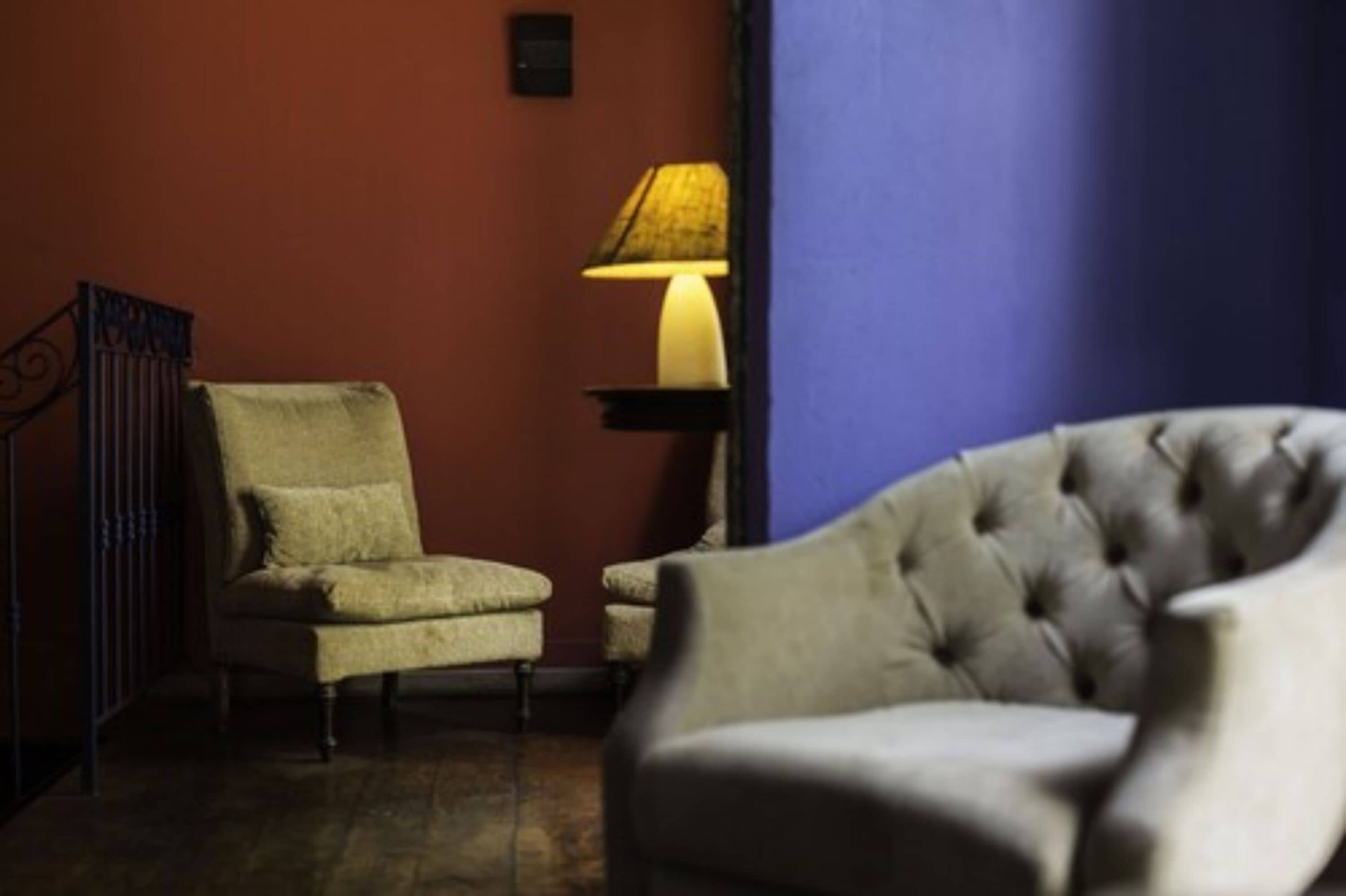 economy double or twin room | living area | 20-inch tv with cable channels