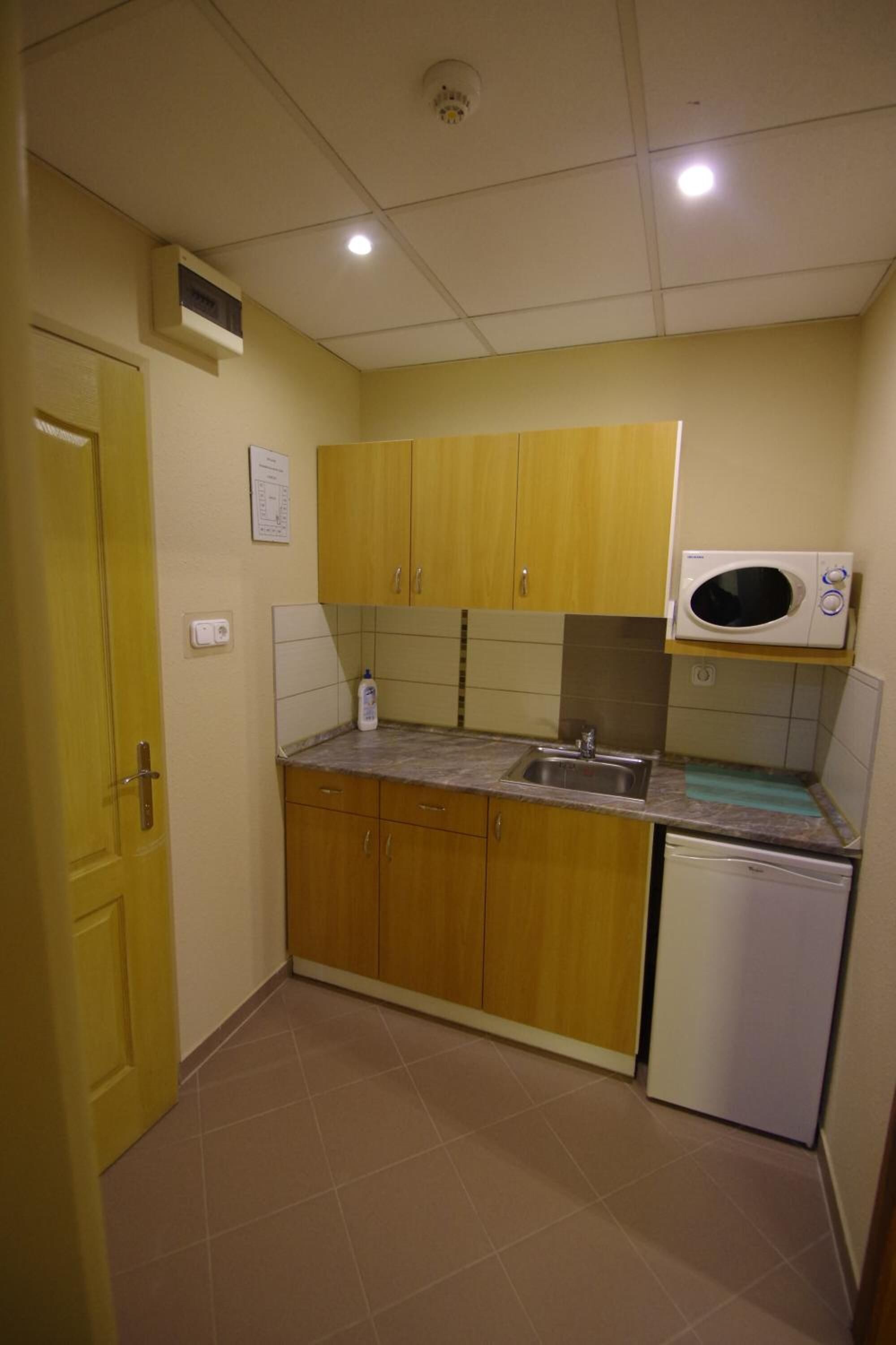 fridge, microwave, cookware/dishes/utensils