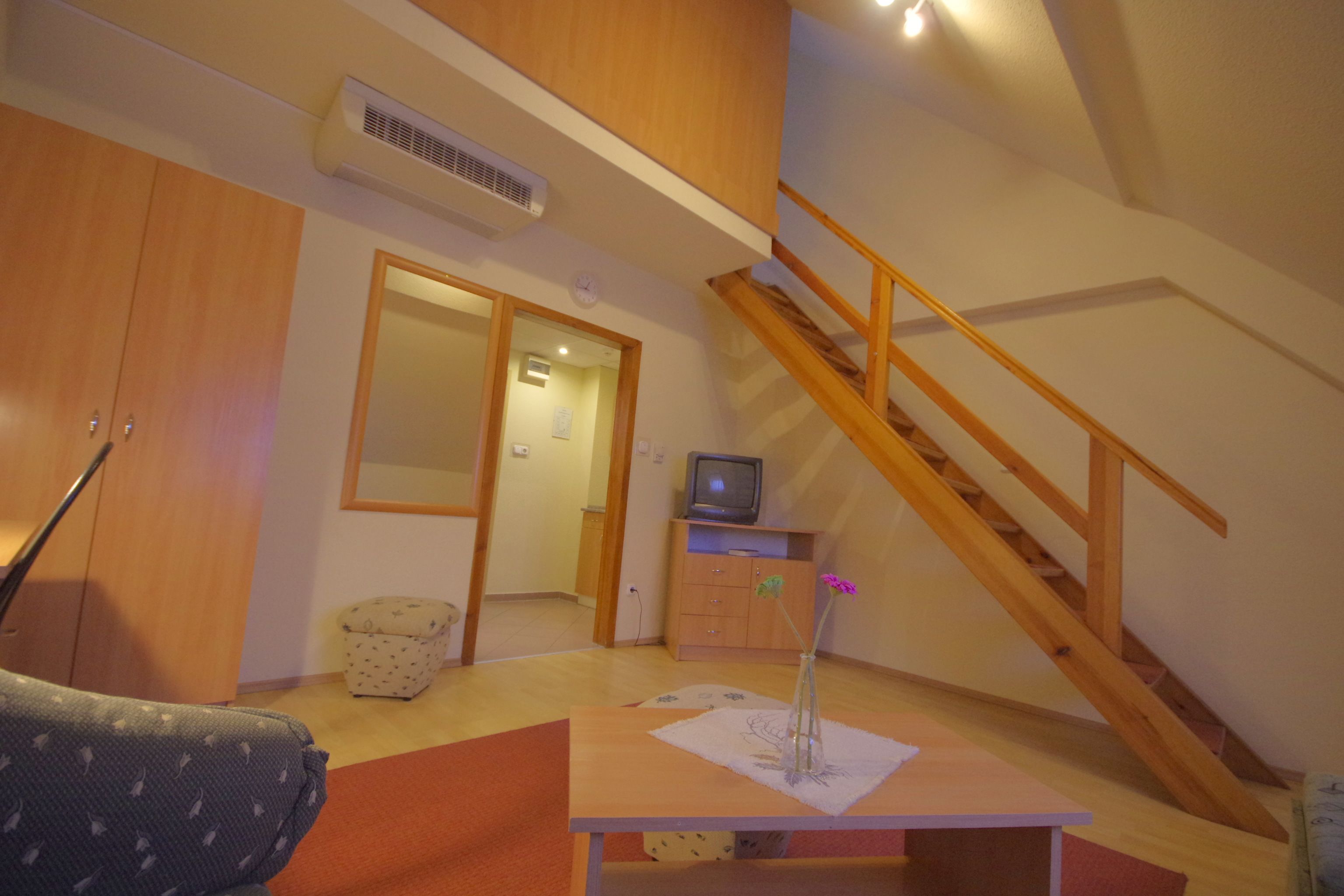 standard triple room, 1 bedroom | living room | lcd tv
