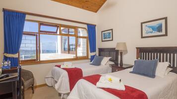 Standard Twin Room (Private Bathroom Opposite Room) | Minibar, in-room safe, individually decorated, individually furnished