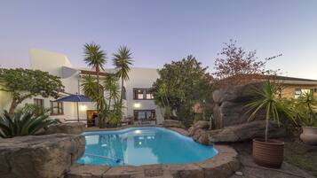 Outdoor pool, pool umbrellas, pool loungers