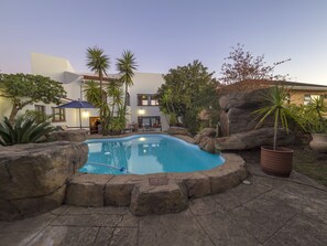 Outdoor pool, pool umbrellas, pool loungers
