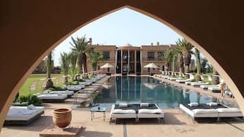 Outdoor pool, pool umbrellas, pool loungers