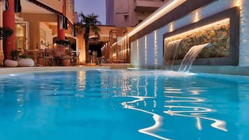 Outdoor pool, pool umbrellas, pool loungers