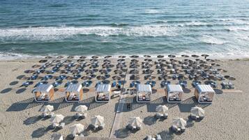 Private beach, sun loungers, beach umbrellas, beach towels