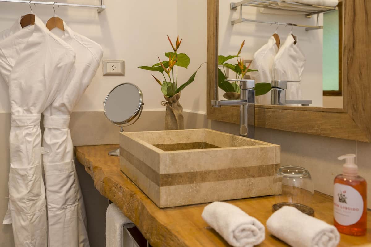 junior studio, 1 king bed | bathroom | combined shower/bathtub, jetted bath, free toiletries, hair dryer