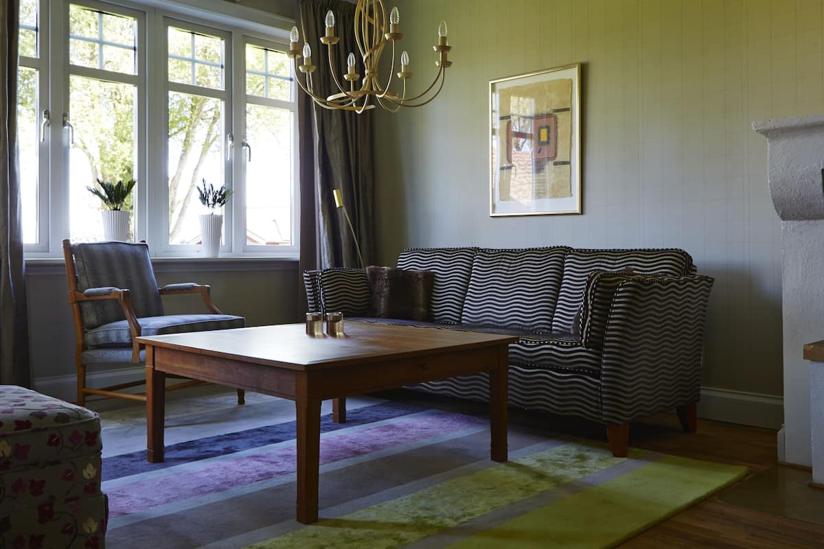 junior suite, 1 king bed, fireplace | 1 bedroom, minibar, individually decorated, individually furnished