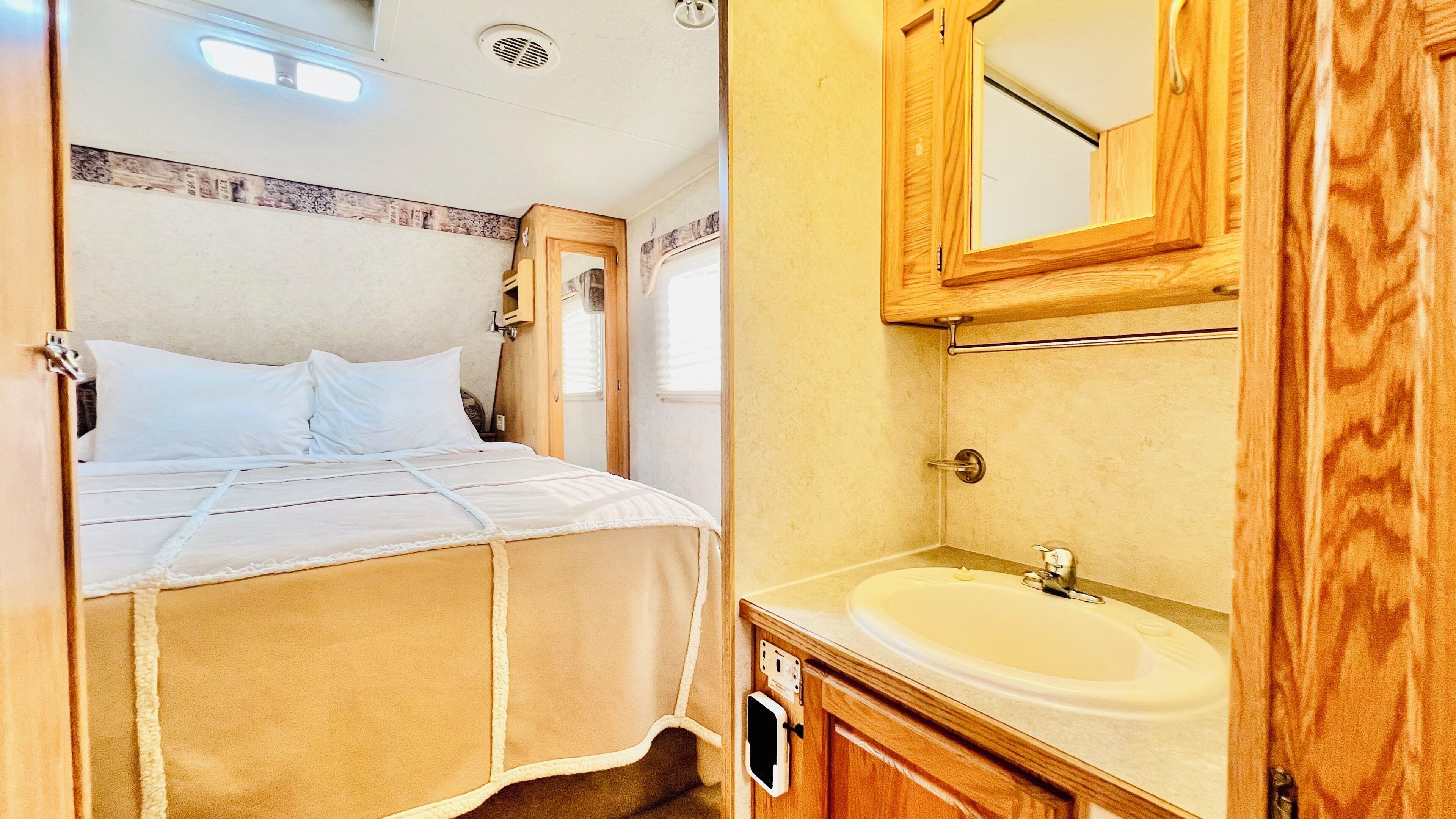 Glamping RV | Blackout drapes, iron/ironing board, free WiFi, bed sheets