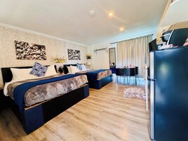 Standard Room, 2 Queen Beds, Patio, Pool View | Individually decorated, individually furnished, blackout drapes