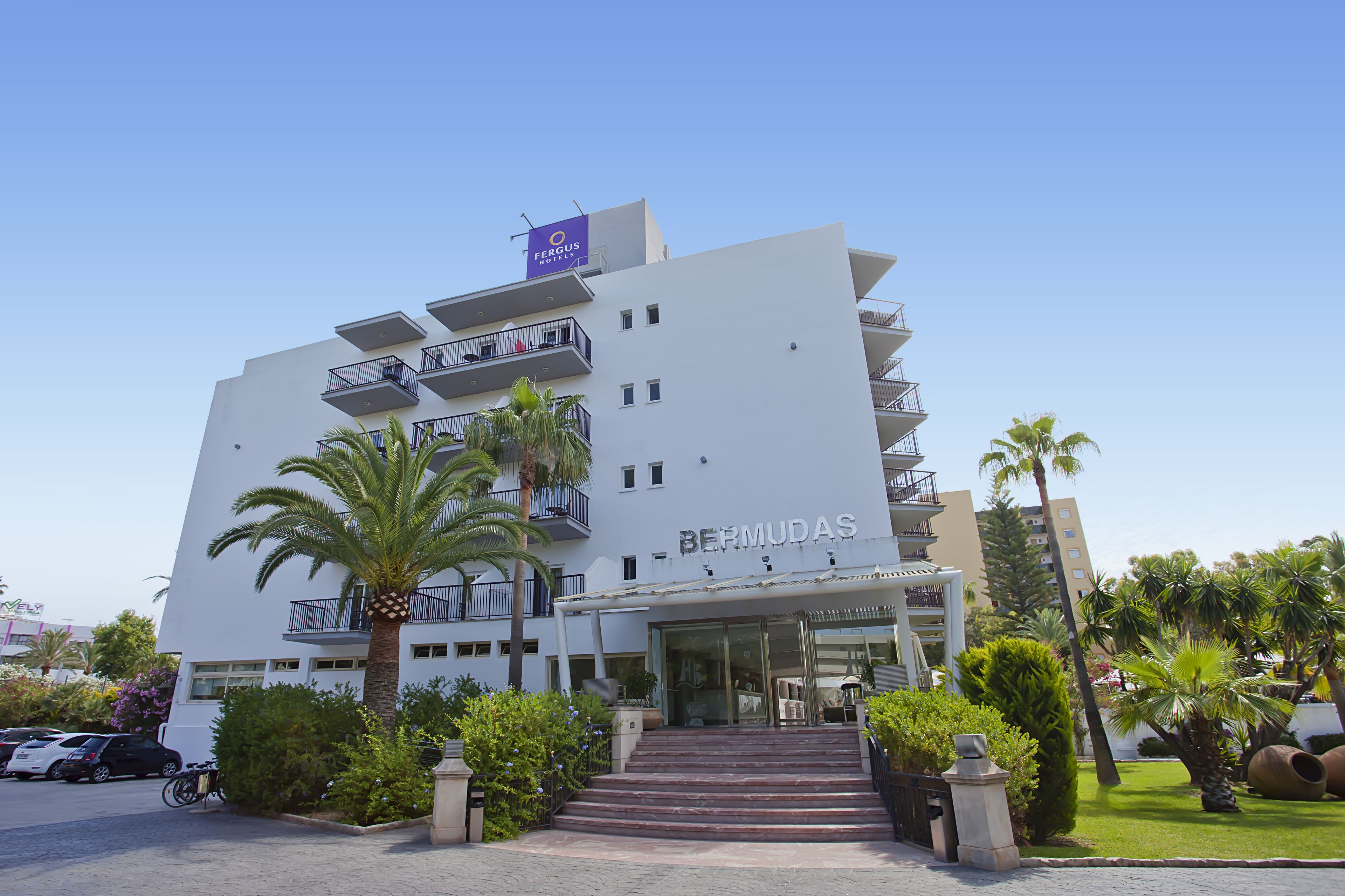 A modern hotel with a prominent sign reading "BERMUDA'S" and a "Fergus" sign above.