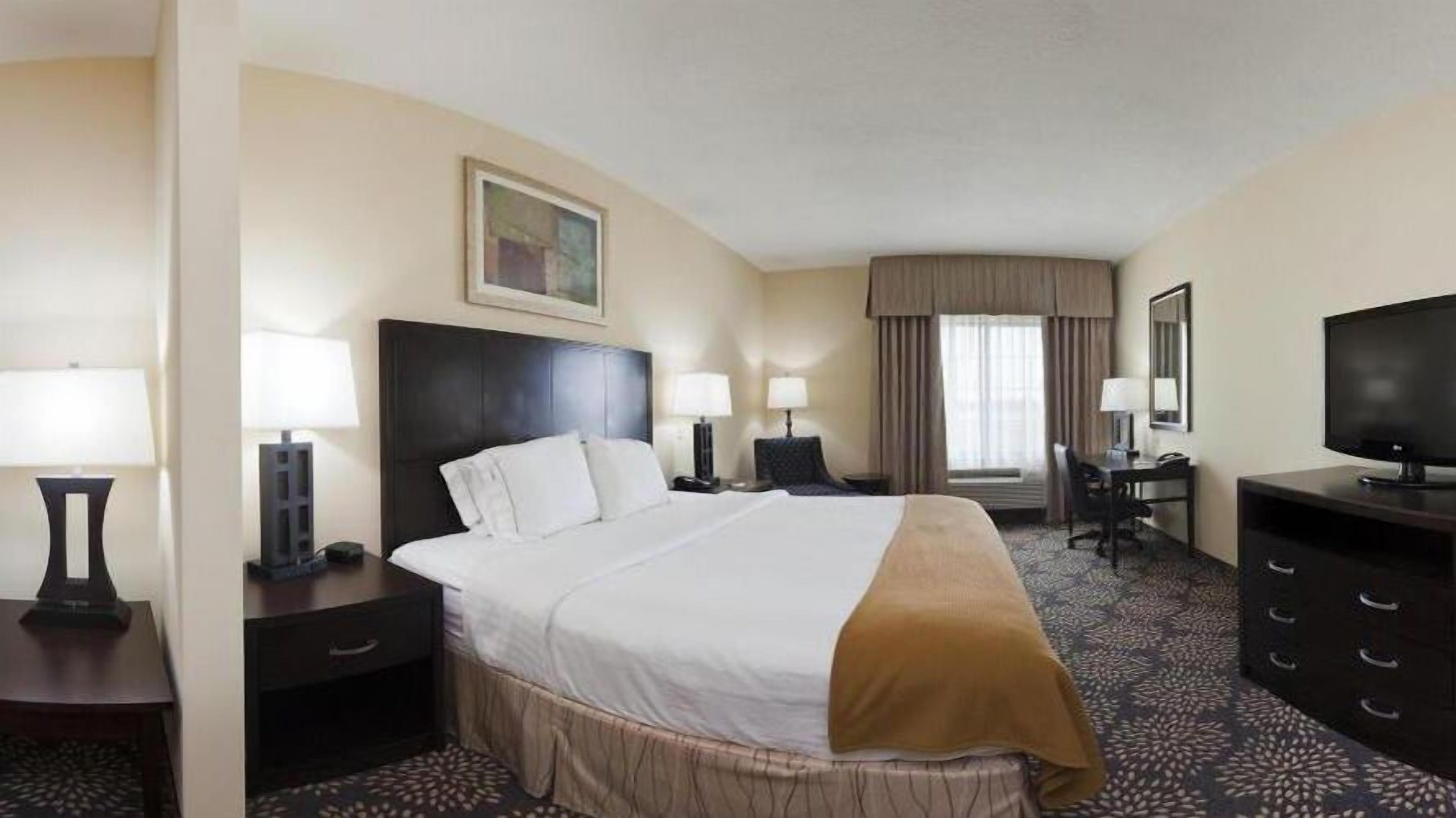 desk, blackout curtains, iron/ironing board, free cots/infant beds